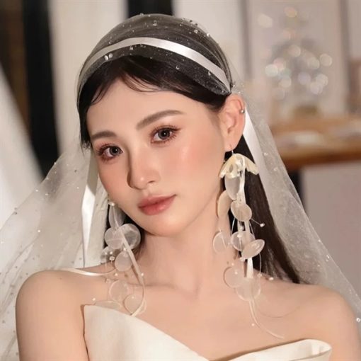 Bông Tai Nơ Vỏ Sò